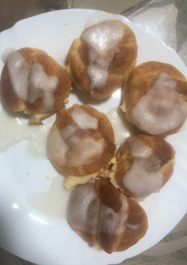 Una foto de Petisú relleno de crema pastelera