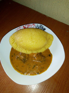 A picture of Eba pie and Ogbonor soup.