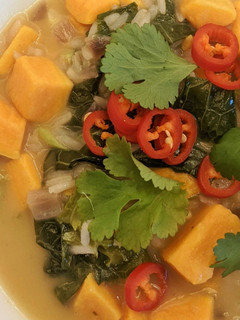 A picture of Sweet potato and coconut green thai curry soup.