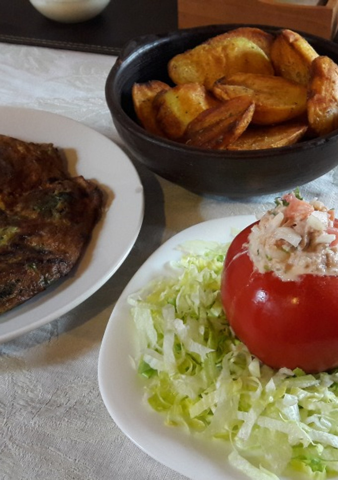 Una foto de Tomate relleno