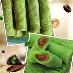 A picture of Sweet coconut filling Pandan crepes.