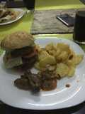 Potato wedges,wet fried gizzards and burger