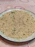 Risotto cotto in brodo di pesce espresso, prezzemolo, parmigiano e burro