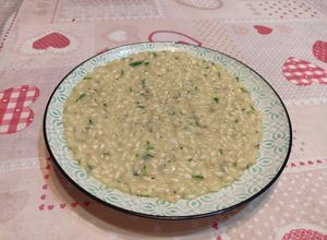 Foto di Risotto cotto in brodo di pesce espresso, prezzemolo, parmigiano e burro