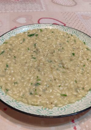 Foto di Risotto cotto in brodo di pesce espresso, prezzemolo, parmigiano e burro