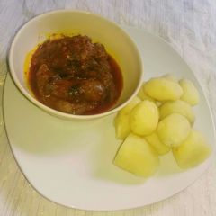 Boiled potatoes with cowtail soup A picture of Boiled potatoes with cowtail soup.