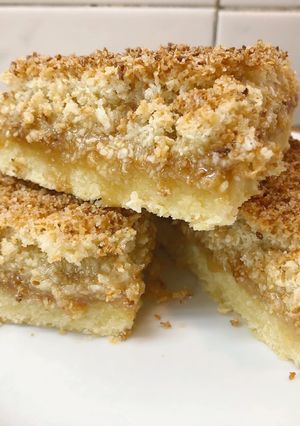 Una foto de Bites de coco y dulce de leche