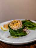 Involtini di branzino con acciughe e funghi porcini