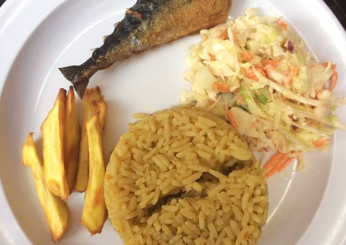 Jollof rice,salad with chips and fish