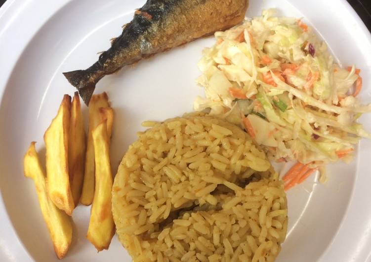 Jollof rice,salad with chips and fish