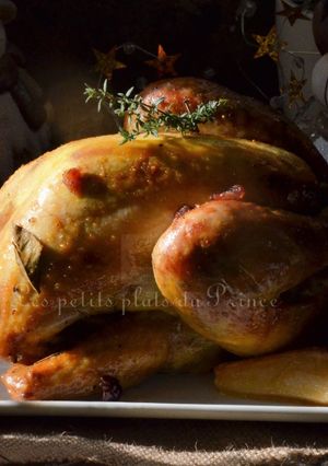 Une photo de Pintade rôtie à la poire et aux marrons