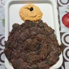 A picture of Murungai Keerai ragi dosa with coconut chutney.