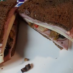 A picture of Ham and Swiss with Muffaletta Olive Salad.