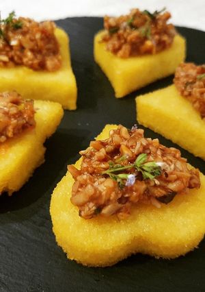 A picture of Fried Polenta Hearts with Pioppini Mushroom Ragù.