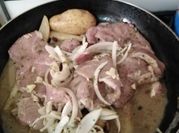 Una foto de lomo al cilantro