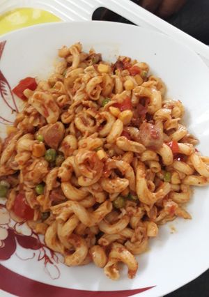 A picture of Macroni with green peas.