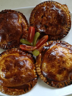 Una foto de Empanadillas de queso de cabra y confitura de tomate