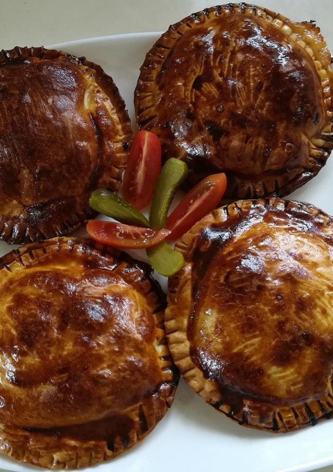 Una foto de Empanadillas de queso de cabra y confitura de tomate