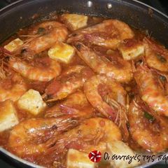 A picture of Shrimps with feta cheese (saganaki).