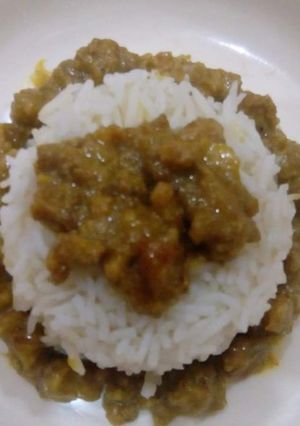 A picture of Mutton boti with boiled rice.