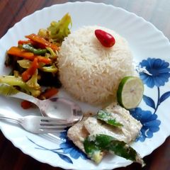 A picture of Steamed Bhetki (Barramundi fish) with Gondhoraj lebu.