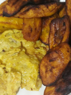 A picture of Fried plantain with fried eggs.