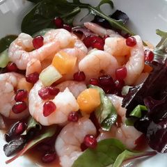 A picture of Sig's Bloody Mary and Pomegranate Prawn Cocktail.