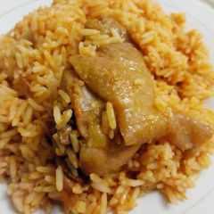 Jollof rice with fried chicken A picture of Jollof rice with fried chicken.