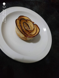 Una foto de Rosas de manzanas y dulce de durazno