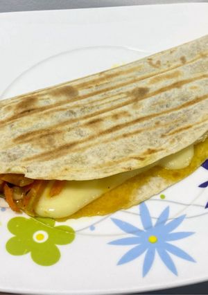 Una foto de Rapiditas de camarones, queso y verduras