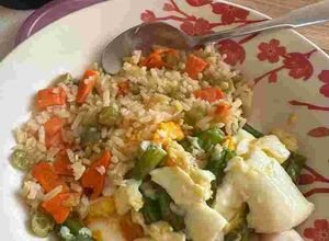 Una foto de Habichuelas con parmesano y huevos