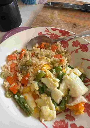 Una foto de Habichuelas con parmesano y huevos