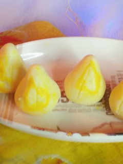 A picture of Mawa Modak/KhoyaModak/Yellow Modak.