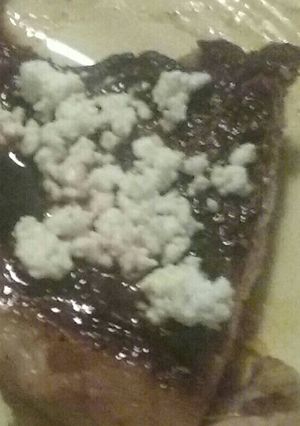 A picture of NY Strip with Feta & Balsamic Vinegar Reduction .