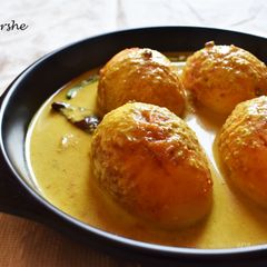 A picture of Dim Posto-Sorshe (Egg cooked in Poppy-Mustard Seed Paste).