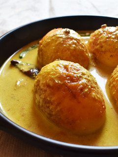 A picture of Dim Posto-Sorshe (Egg cooked in Poppy-Mustard Seed Paste).