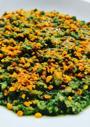 A picture of Creamy Swiss Chard Orzotto with Golden Almond Crumbles.