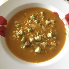 A picture of Tomato vegetable creamy soup.