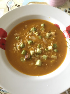 A picture of Tomato vegetable creamy soup.