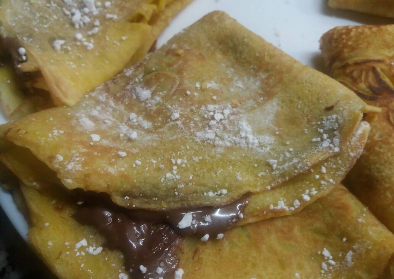 Crepes de naranja rellenas de nutella