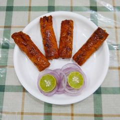 A picture of Chicken seekh kababs.