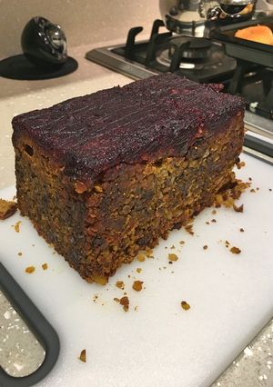 A picture of Cranberry Sauce Topped Nut & Lentil Roast.