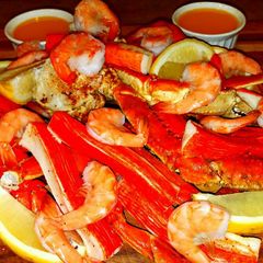 A picture of Mike's Seafood Meat Bread & Cheese Appetizer Boards.