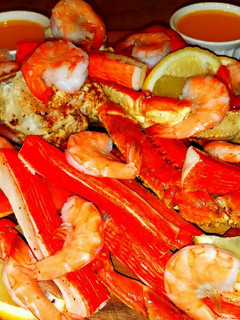 A picture of Mike's Seafood Meat Bread & Cheese Appetizer Boards.