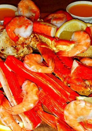 A picture of Mike's Seafood Meat Bread & Cheese Appetizer Boards.