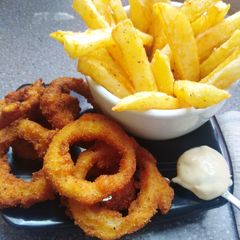 A picture of Homemade onion rings.