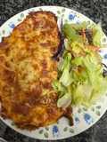 460. Milanesa a la napolitana (principal carne)