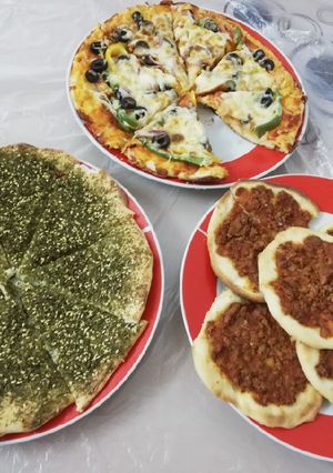 صورة لوصفة بيتزا ومعجنات بالعجينه القطنية 😋