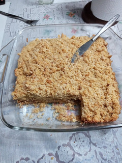 Una foto de Tarta de coco integral con dulce de leche y pasta de maní