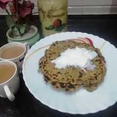 A picture of Mix Veg Paratha with fresh malai.